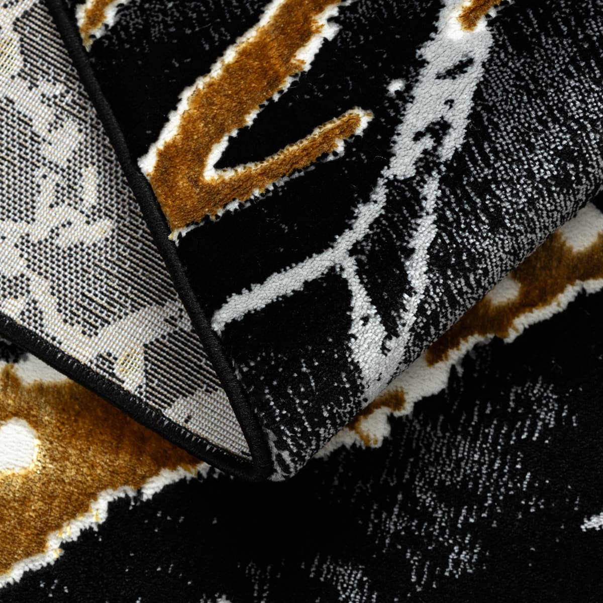 Kusový koberec Allure 1963 black/gold 9