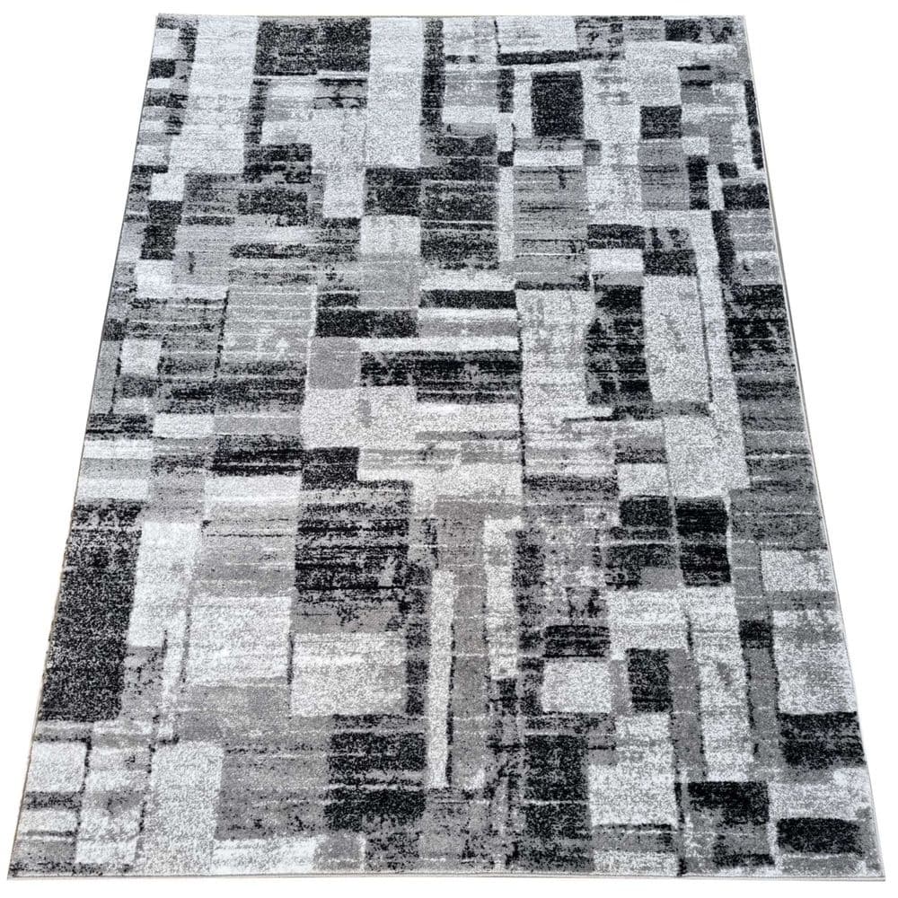 Kusový koberec Demian se vzorem patchwork, šedý / bílý